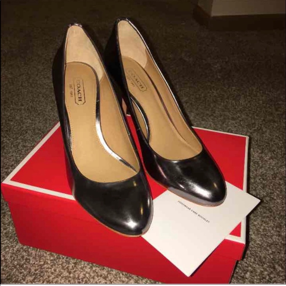 Coach silver heels.